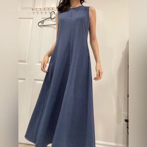 Elegant Blue Sleeveless Dress with Pocket